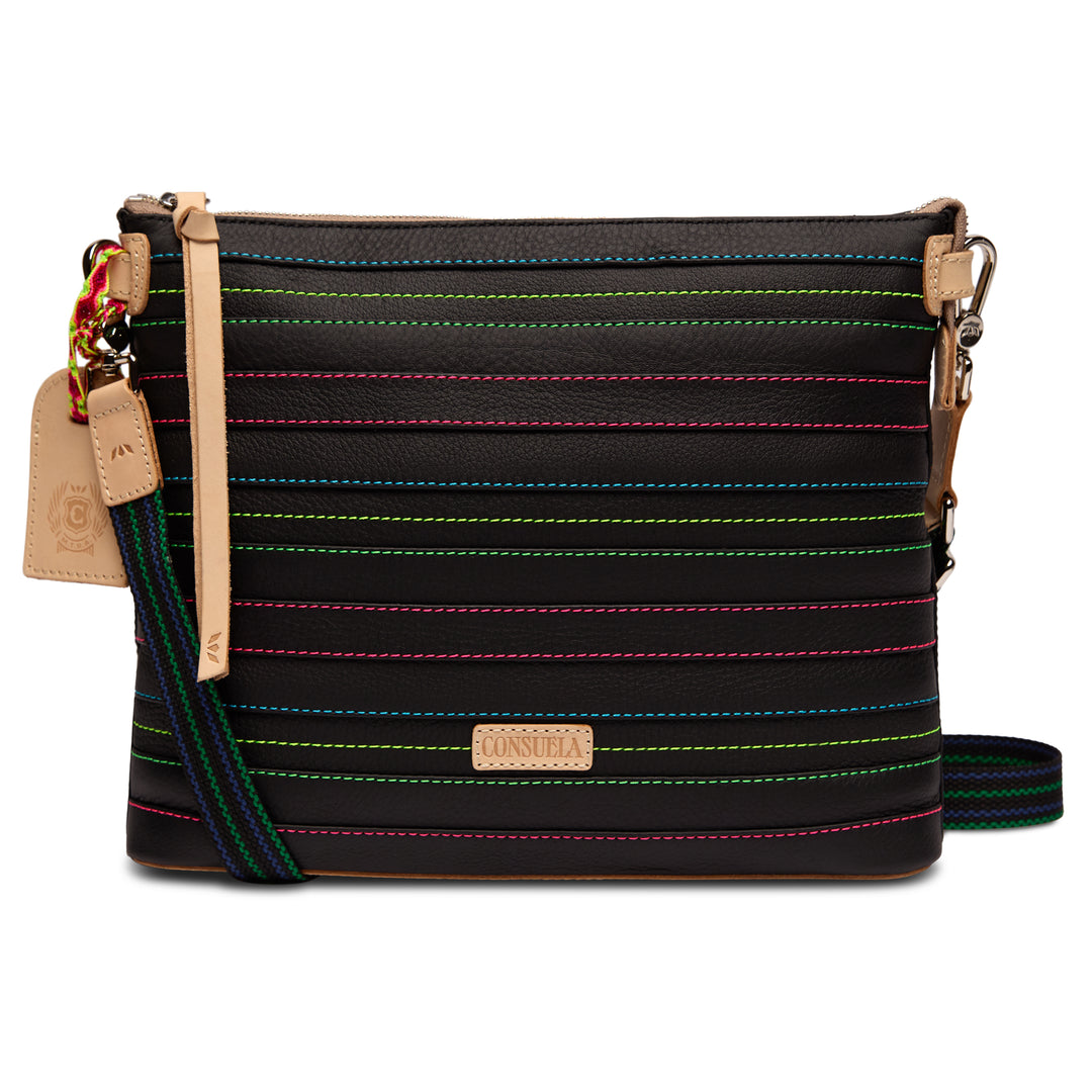 Consuela Ray Downtown Crossbody in black leather with rows of colorful multi-color contrast stitching, front view with natural leather accents and a Consuela hangtag.