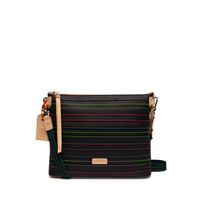 Consuela Ray Downtown Crossbody in black leather with multi-color stitching, front view with an adjustable woven strap draped to the side.