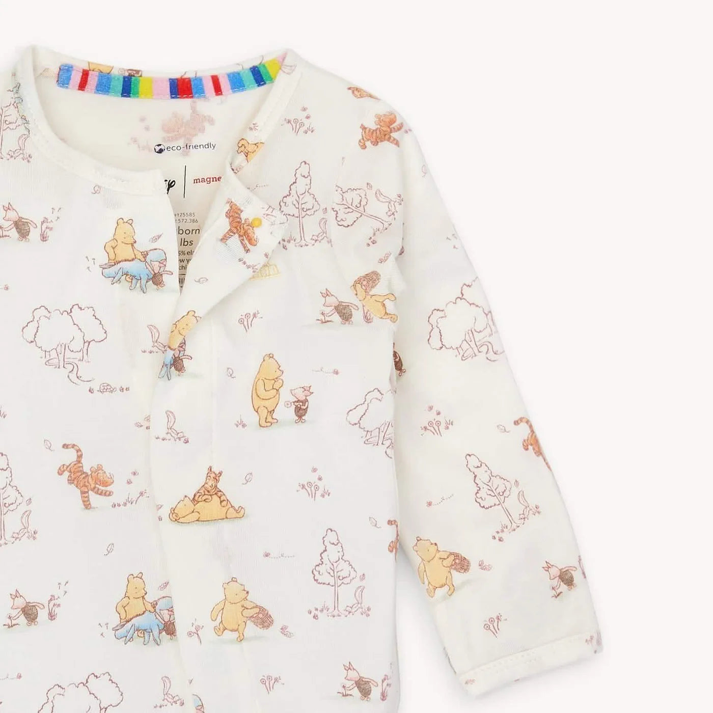 Close-up of the hidden magnetic closure seam and the Disney character print on the Magnetic Me sleeper.