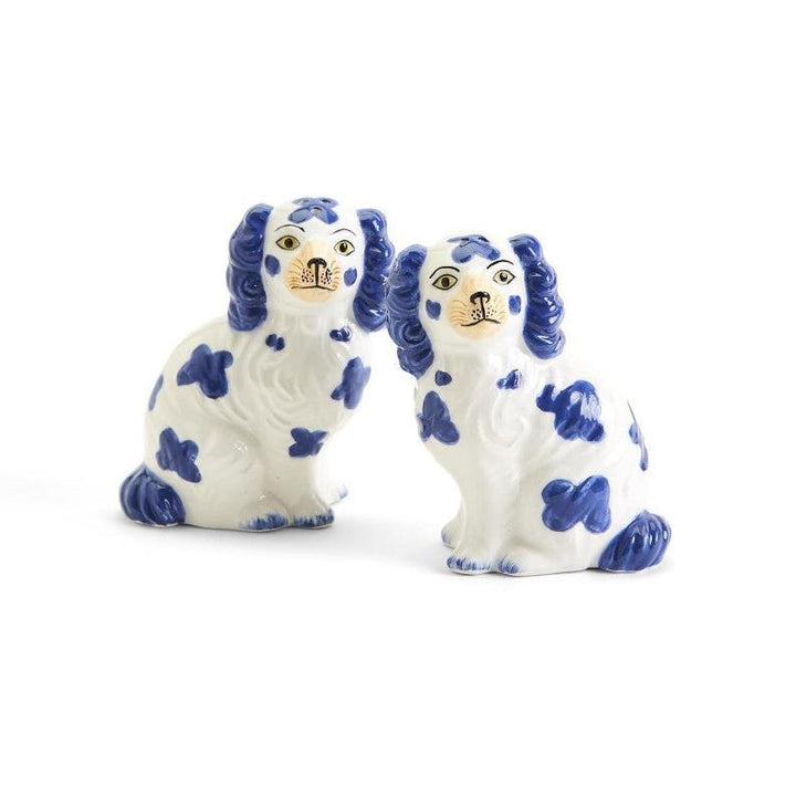 Pair of Staffordshire Dog salt and pepper shakers in hand-painted blue and white ceramic.