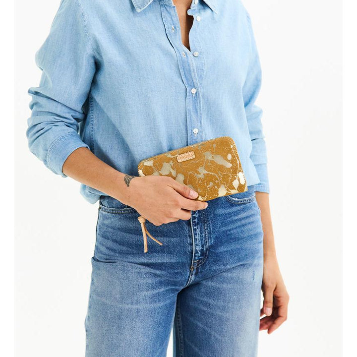 Consuela Beau Essential Wallet featuring a metallic hand-splattered leather suede exterior.