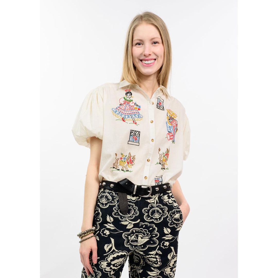 Sister Mary Flamenco Top in Ivory featuring beautiful artisan embellishments and a flowing boho design.