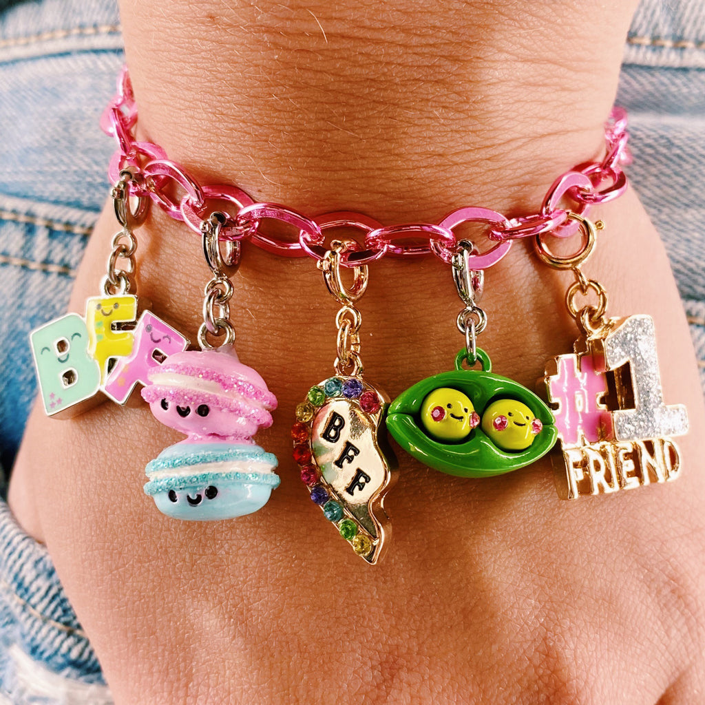 Girls charm bracelet featuring the Charm It Macaron Buddies charm and friends charms