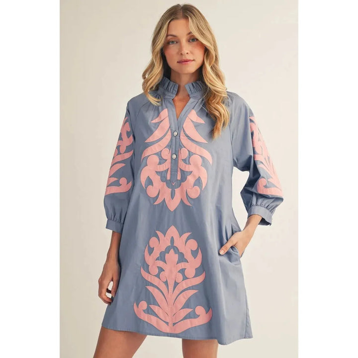 Jodifl Genevieve shift dress in cornflower blue and pink with elegant baroque floral appliqué and a ruffled high neckline.