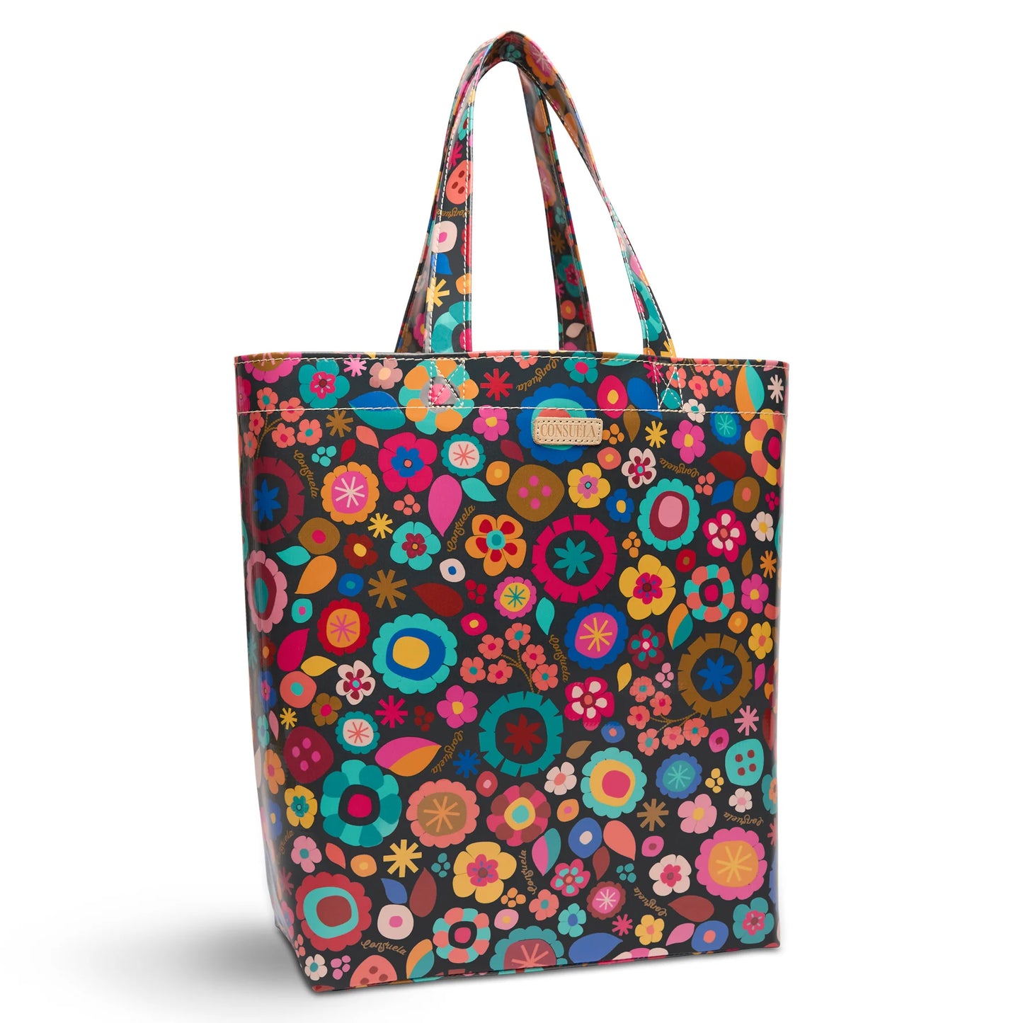 Close-up of the Amelie floral print and Diego natural leather logo accent on the Basic Bag.