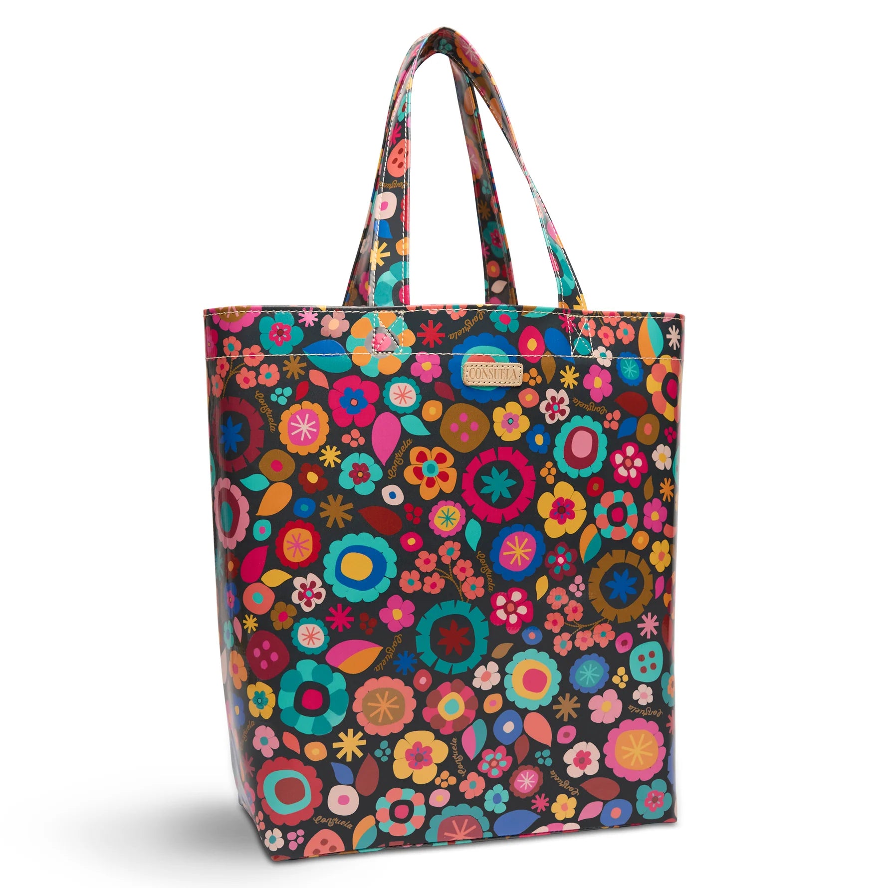 Close-up of the Amelie floral print and Diego natural leather logo accent on the Basic Bag.