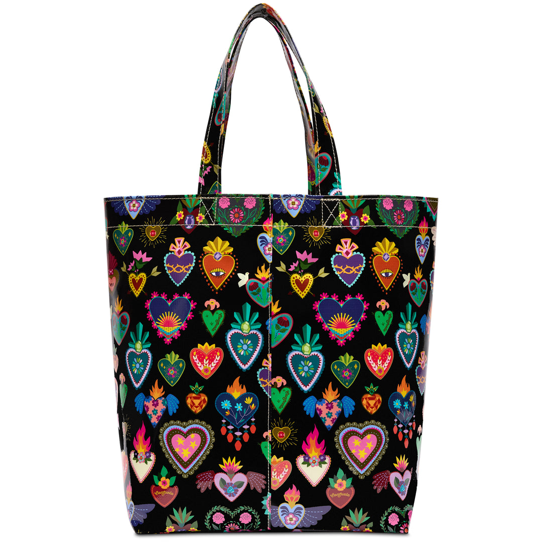 Front panel of the Consuela Vida black tote featuring vibrant embroidered-style hearts, flowers, and flames with sturdy carry handles.