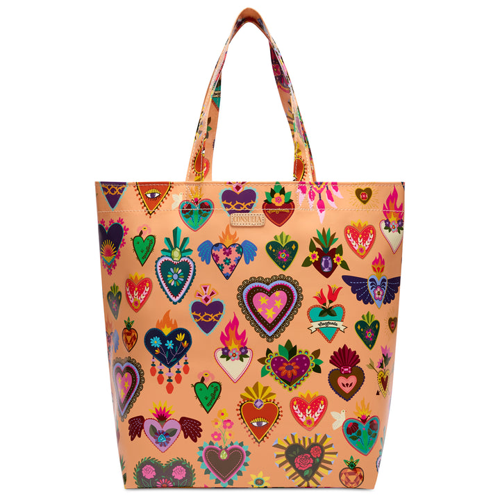 Consuela Peach Grab n Go Basic tote in glossy peach, front view showing colorful sacred-heart designs and a Consuela leather logo tab.