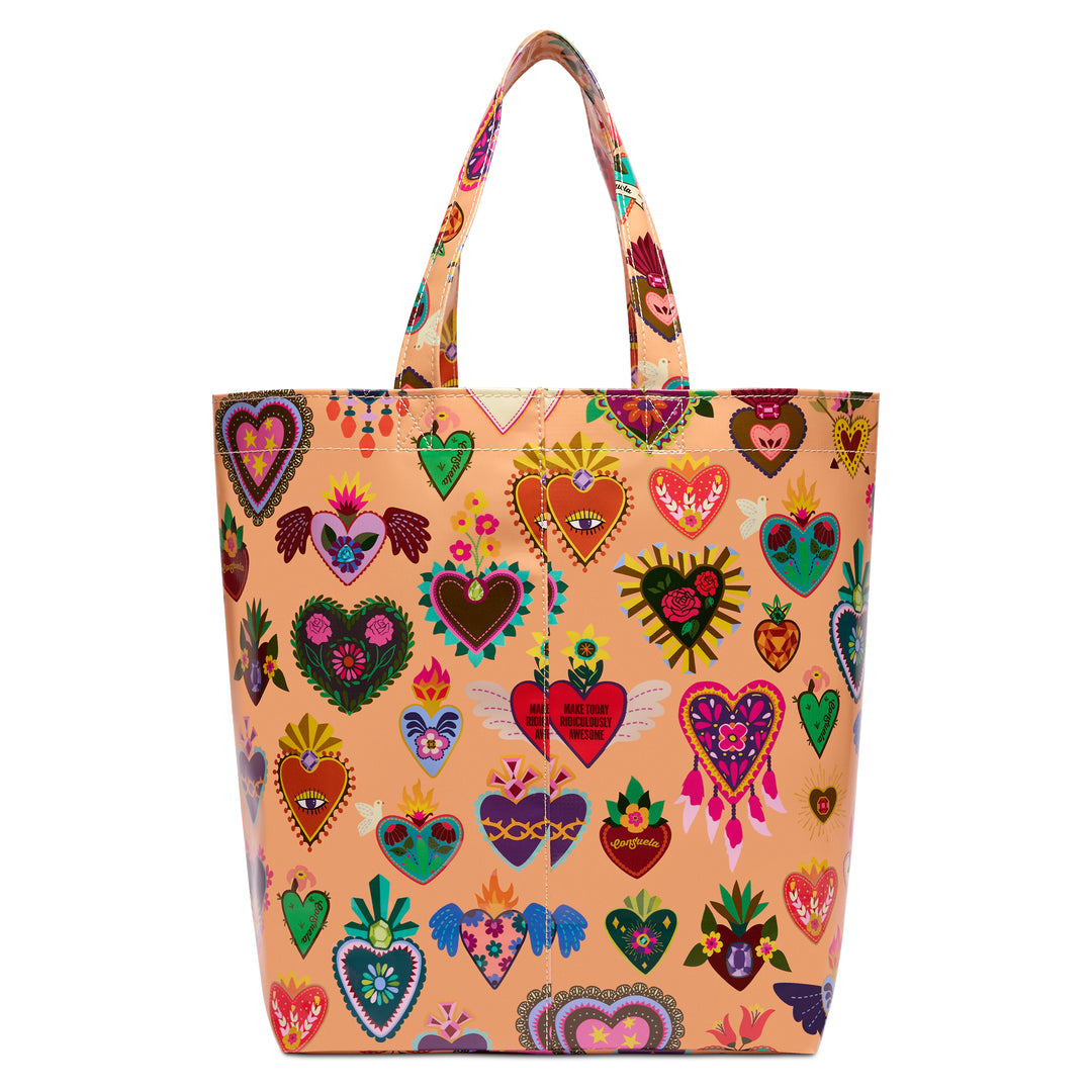 Front view of the Consuela Peach Grab n Go Basic tote, its peach body covered in vibrant corazon hearts, flames, and flowers.