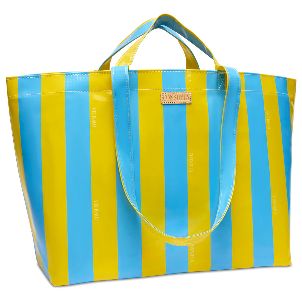 Close-up of the Surfside striped ConsuelaCloth pattern and Diego natural leather logo accent.