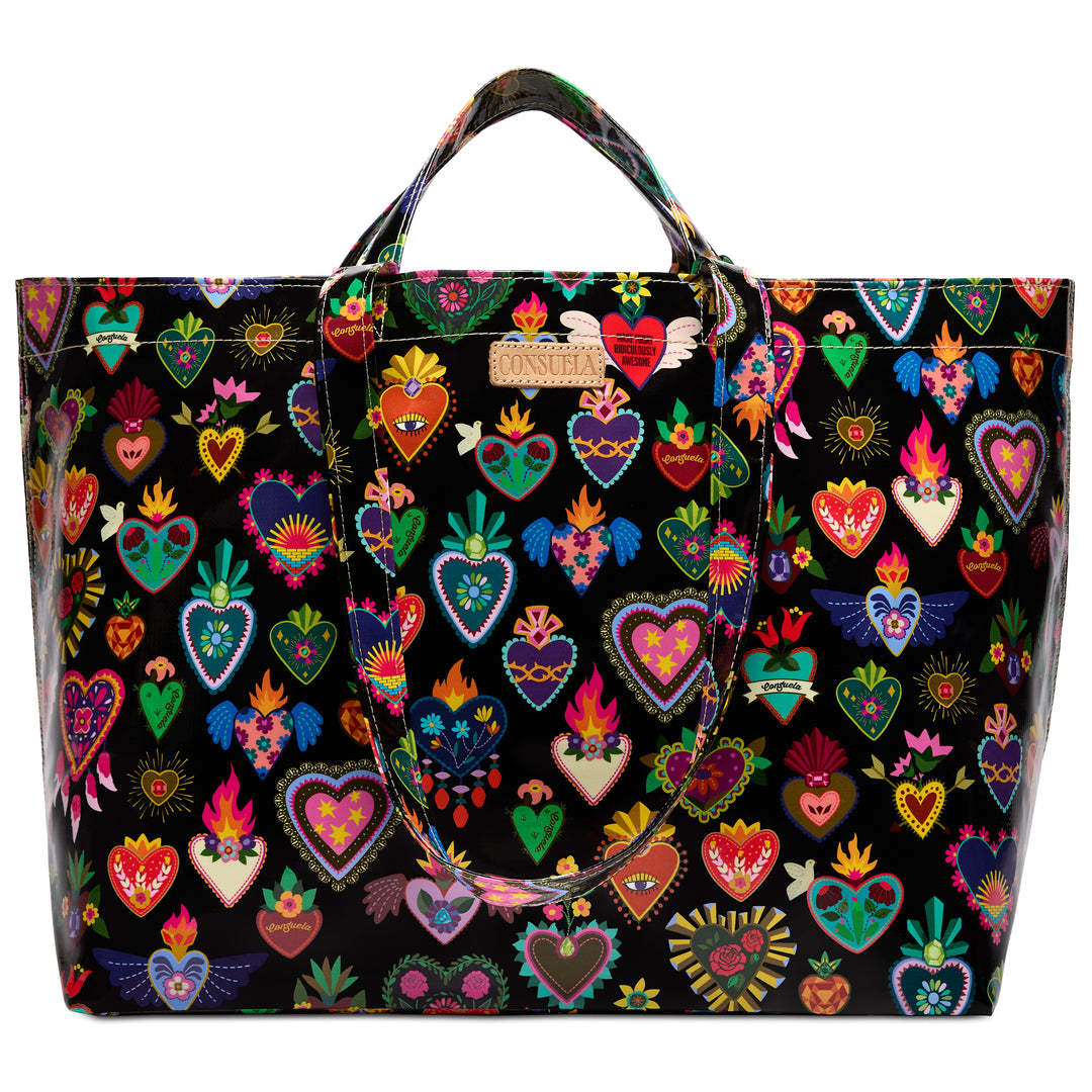 Consuela Vida Grab n Go Jumbo oversized tote in glossy black, front view showing colorful sacred-heart designs and a Consuela leather logo tab.