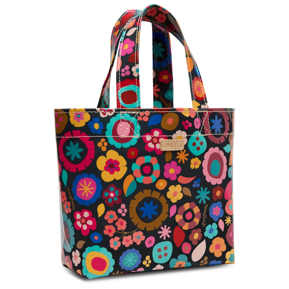 Side profile of the compact Amelie Mini bag highlighting the 4-inch depth and structured base.
