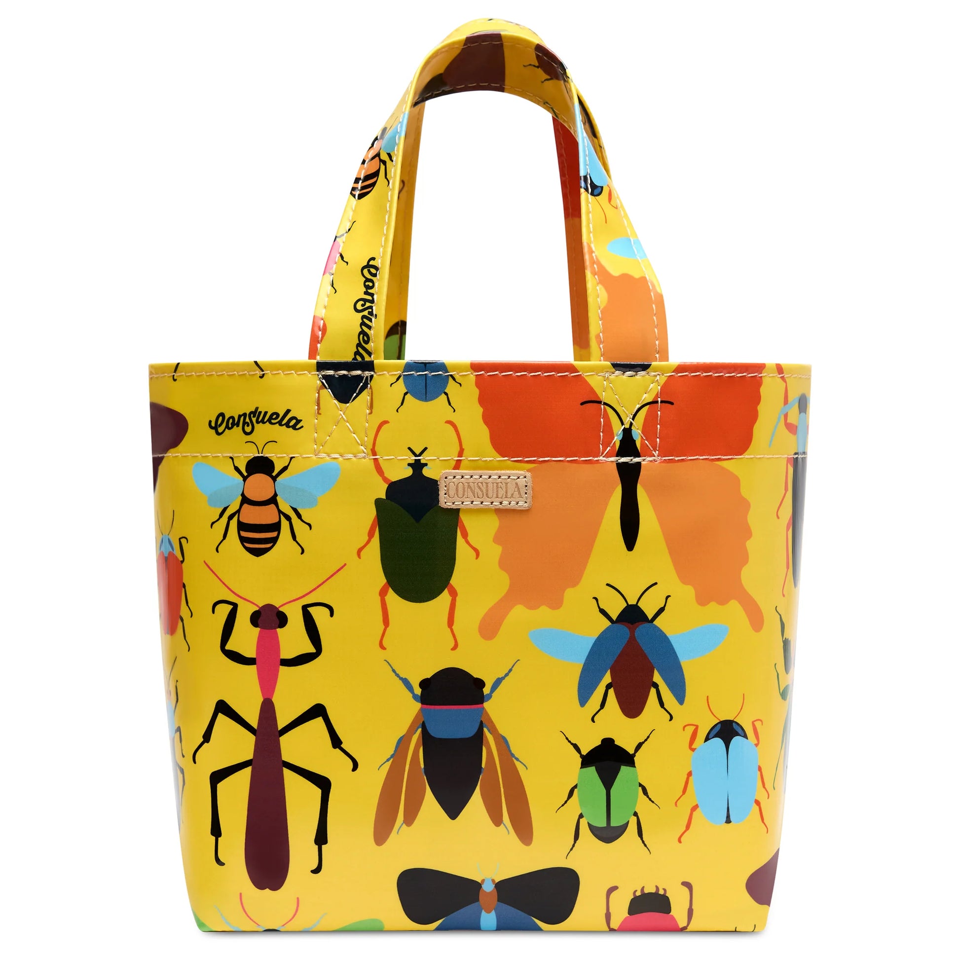 Consuela Fields Mini Bag; a small floral print utility tote with tan leather handles and a vibrant yellow, blue, and pink flower design.