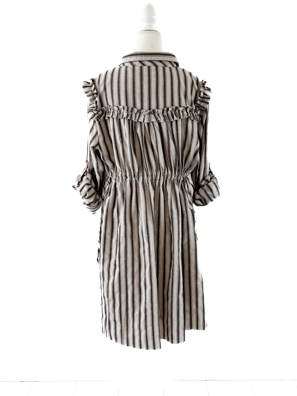 Model styling the one-size Winton and Waits black Western Stripe Giddy Up Dress.