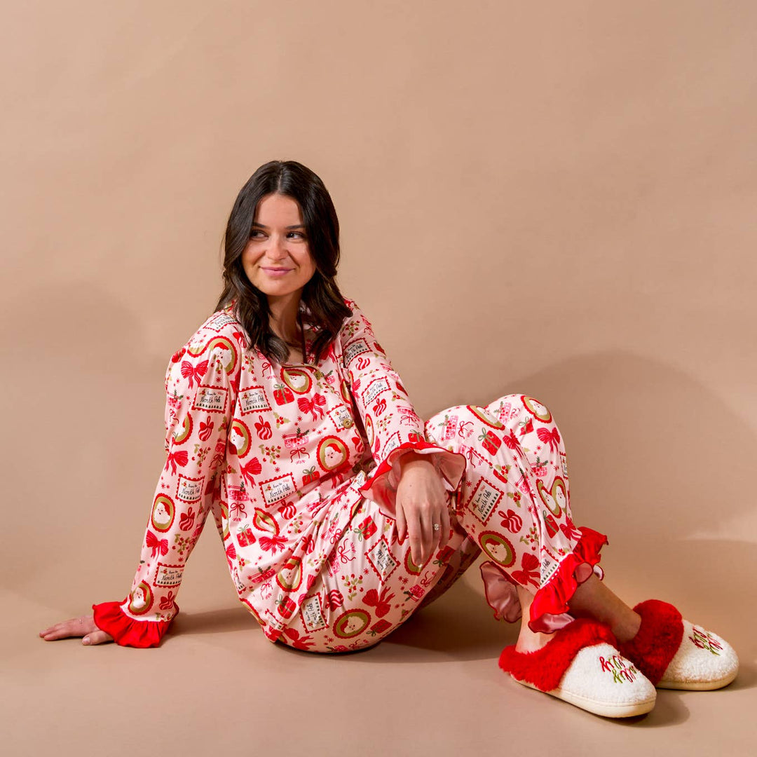 Buttery-soft stretch holiday pajamas by The Darling Effect in the Mistletoe Magic print.