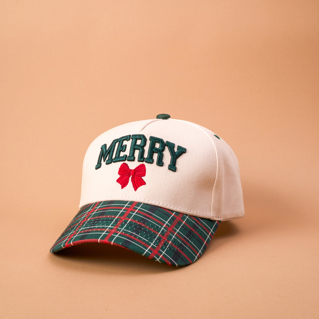 The Darling Effect Classic Canvas Hat featuring festive MERRY embroidery and a holiday plaid brim.