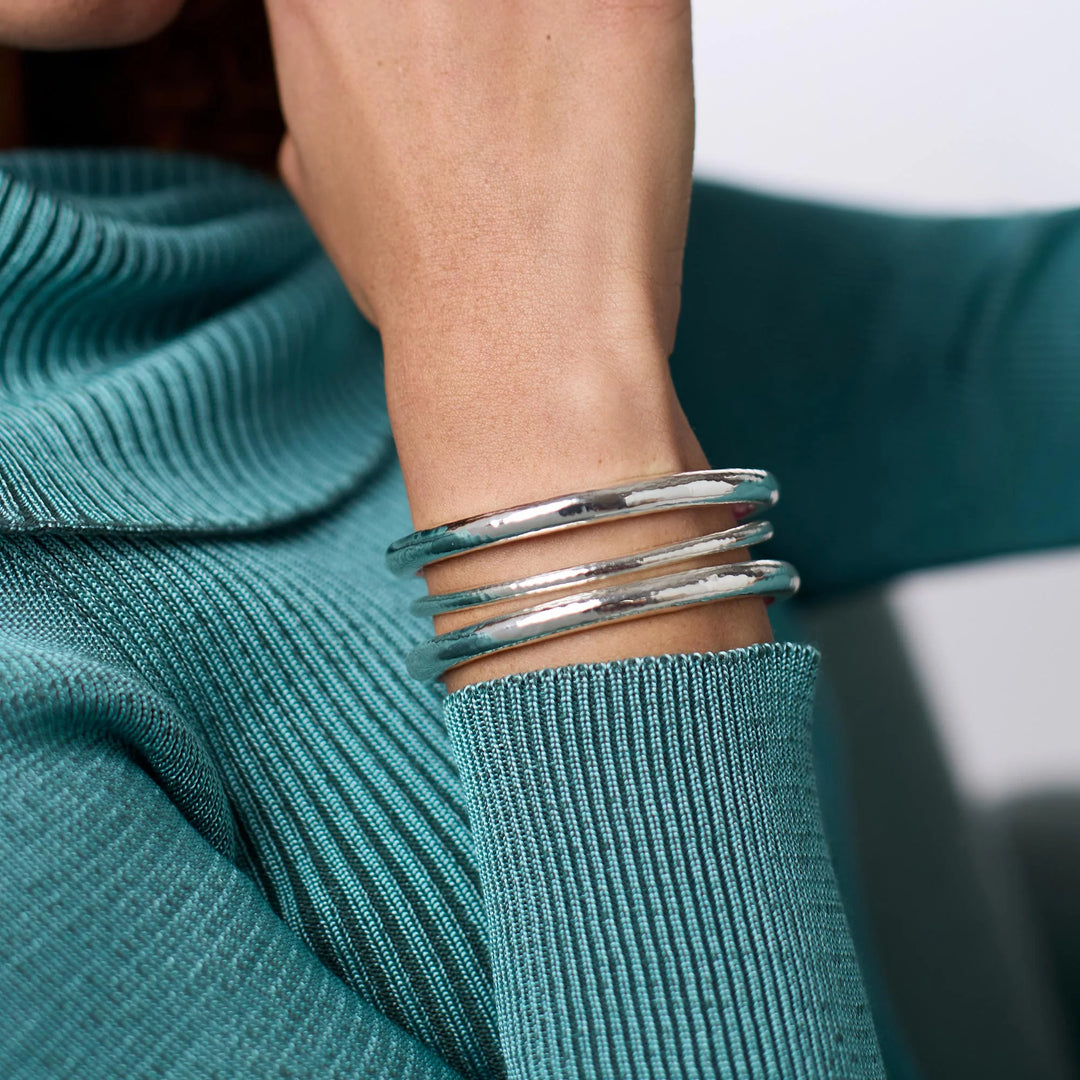 Side profile of the Havana Demi Bangle showing the 0.2-inch width and artisan craftsmanship.