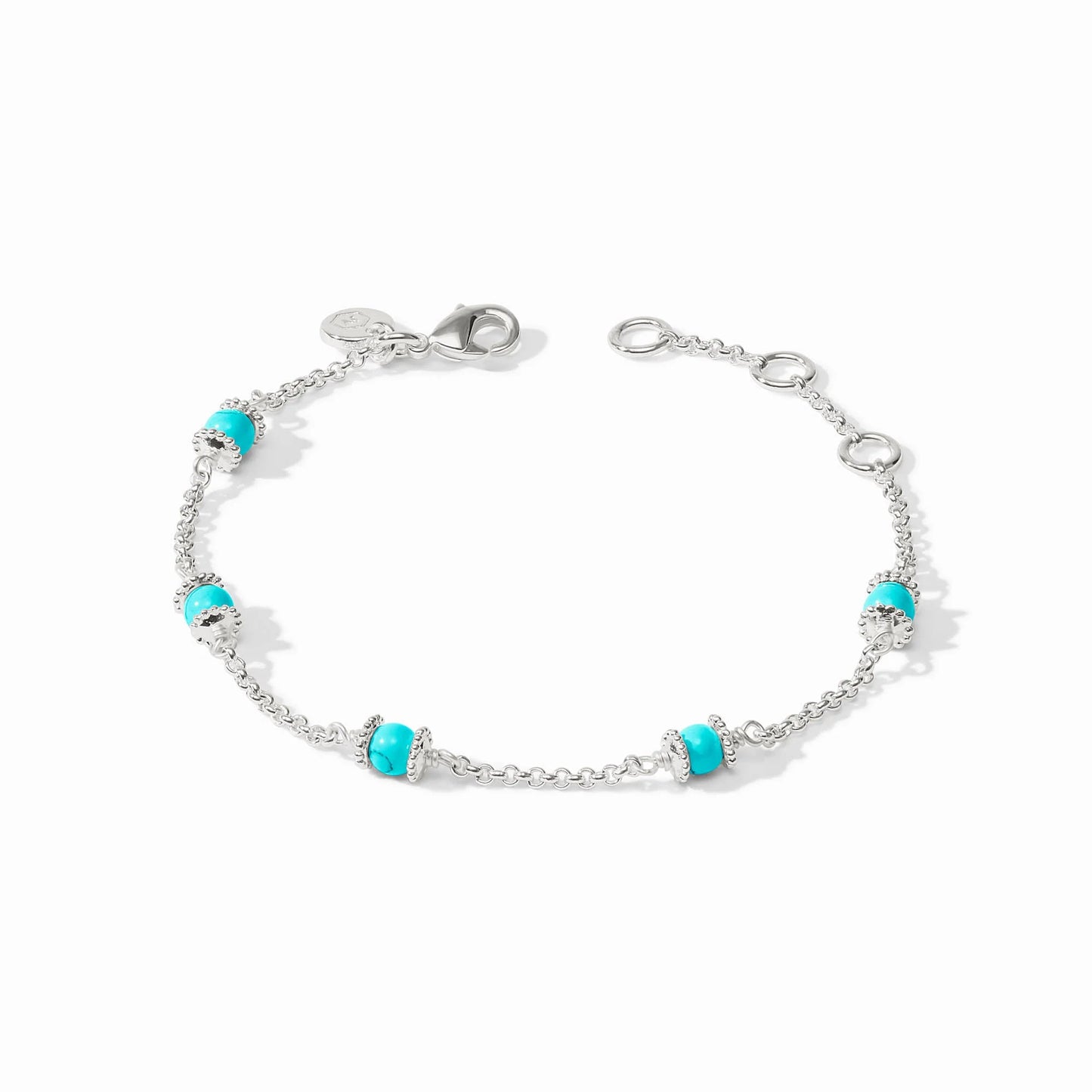 Close-up of the silver Hydra bracelet with a turquoise stone and the silver-tone lobster clasp.