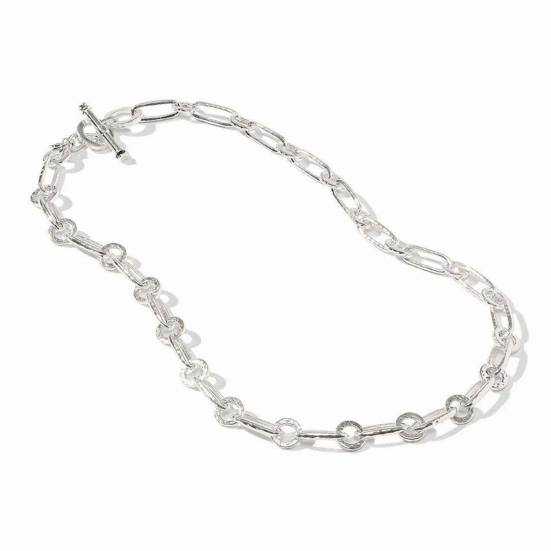 Close-up of the hand-hammered link detail and the Julie Vos hallmark on the silver Palladio necklace.