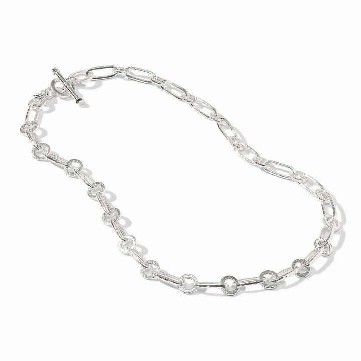 Close-up of the hand-hammered link detail and the Julie Vos hallmark on the silver Palladio necklace.