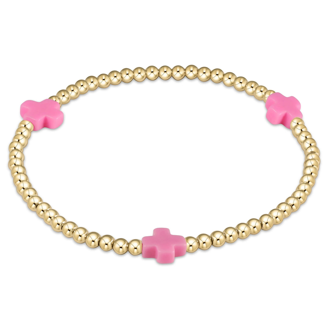 enewton Extends Signature Cross 3mm gold-filled bracelet in bright pink, extended 7.25 inch size on stretch elastic