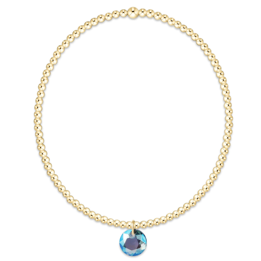 enewton Classic Gold 2mm bracelet with March aquamarine Reflection small crystal charm, 14k gold-filled on stretch elastic