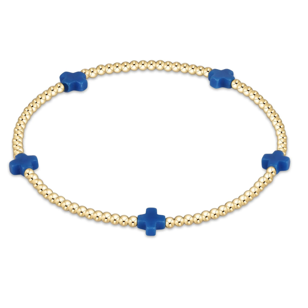 enewton Signature Cross 2mm gold-filled bracelet in cobalt blue, hand-beaded on stretch elastic