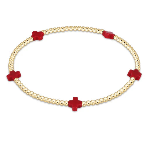 enewton signature cross small 2mm gold-filled bead bracelet with red accents on high-performance elastic