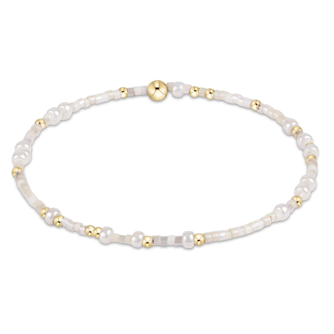 enewton Hope Unwritten beaded bracelet in Shell We Dance coastal colors with gold-filled accents; 7.25 inch extends size.