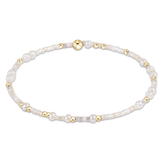 enewton Hope Unwritten beaded bracelet in Shell We Dance coastal colors with gold-filled accents; 7.25 inch extends size.