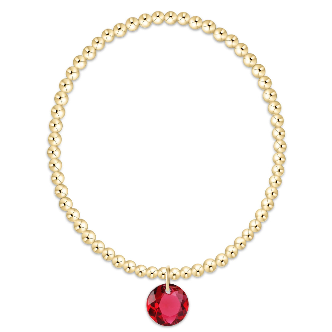 enewton Classic Gold 2mm bracelet with July ruby Reflection small crystal charm, 14k gold-filled on stretch elastic