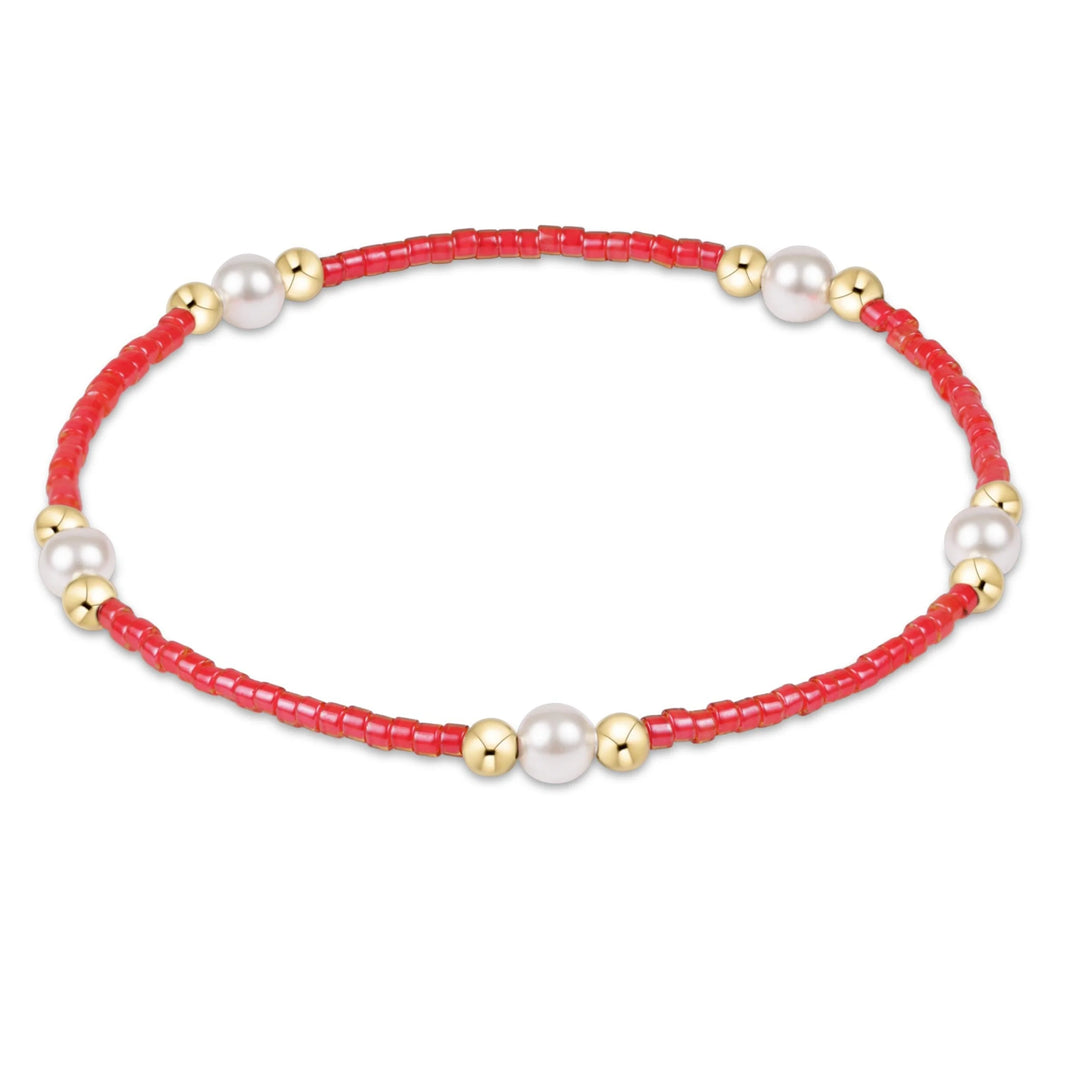enewton Hope Purpose Pearl Bracelet in sherbert pink with pearl and 14k gold-filled beads on stretch elastic