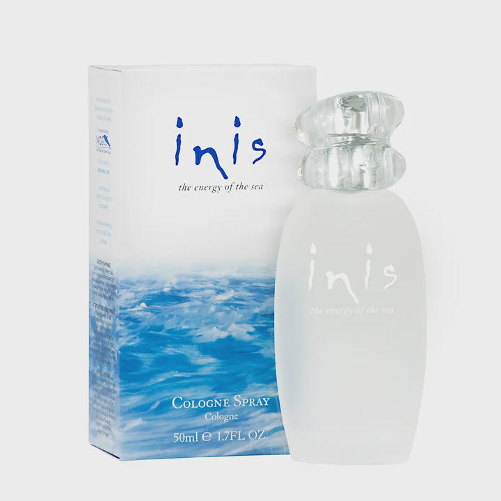 Inis Cologne Energy of the Sea signature scent bottle in a clear glass spray dispenser with ocean-inspired packaging.