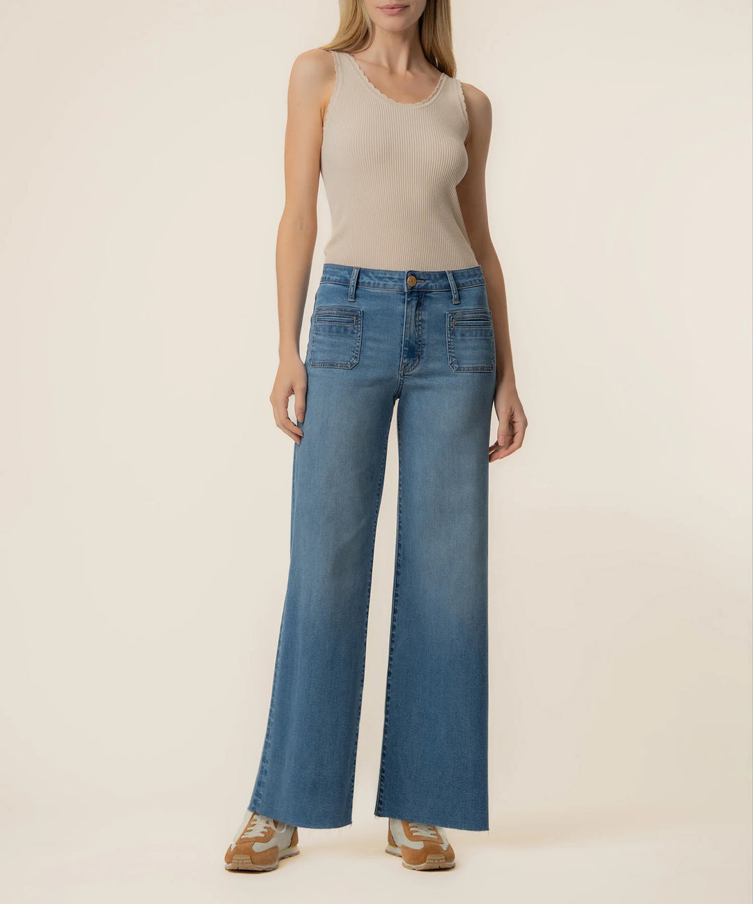 Kut from the Kloth Meg High Rise Wide Leg pants in Sunny Wash showcasing the medium wash stretch fabric and front patch pocket styling.