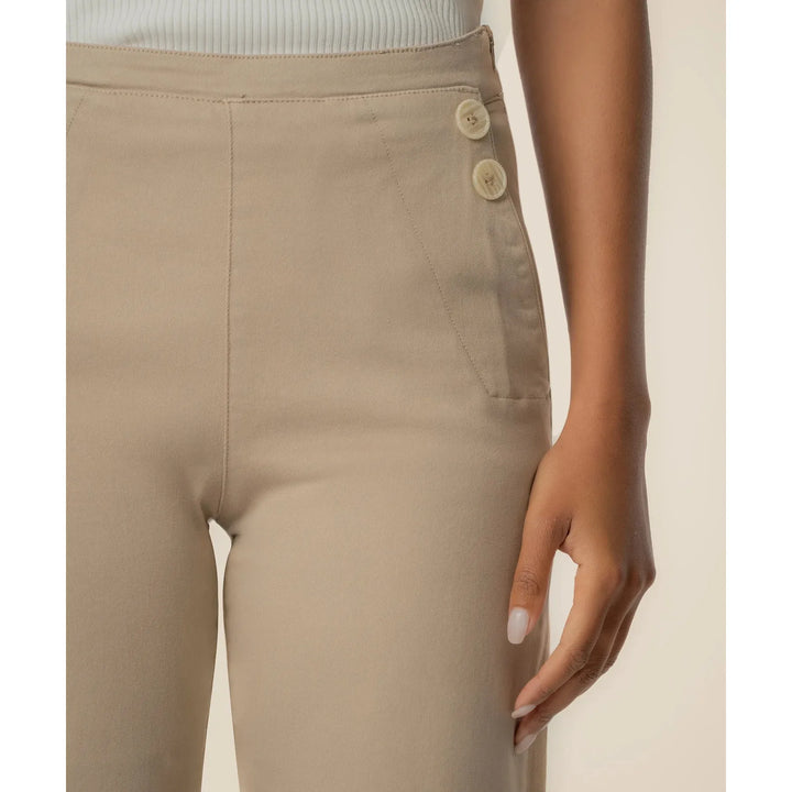 Close-up of the front button accents and soft twill fabric on the Charlotte Sand trousers.