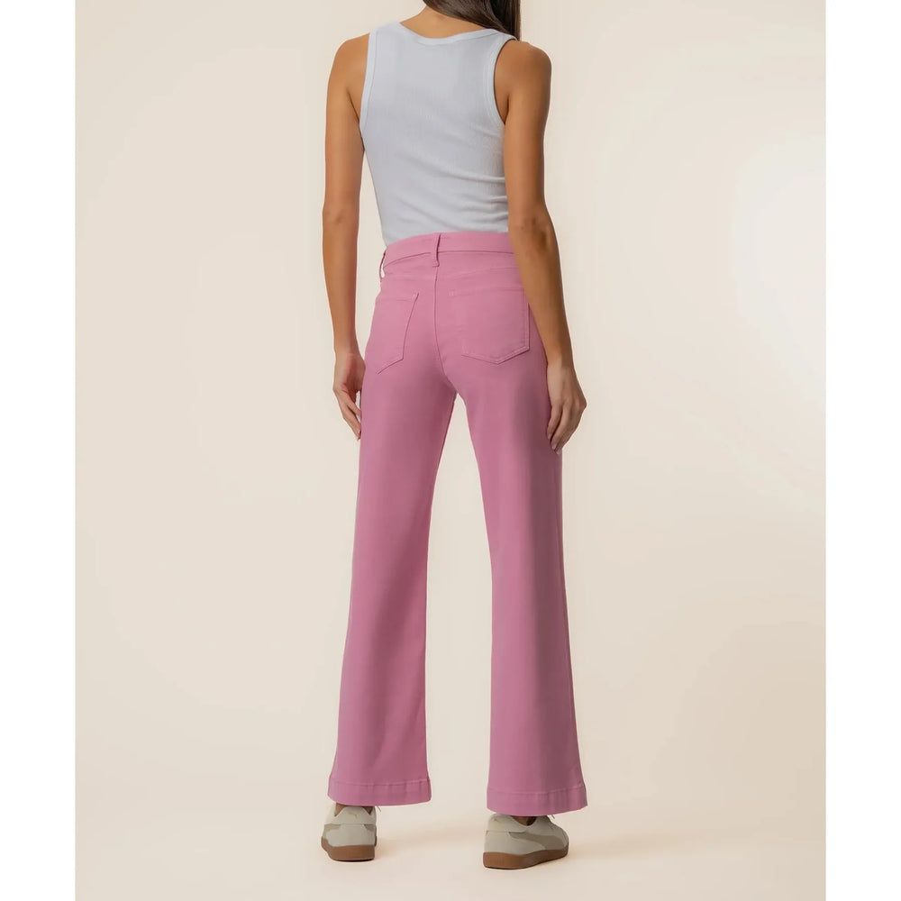 Close-up of the Cupcake pink fabric texture and functional patch pocket detailing on Meg pants.