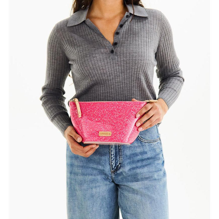 Consuela Bae Large Tool Kit featuring a bright multicolored glitter exterior and a natural leather zipper pull.