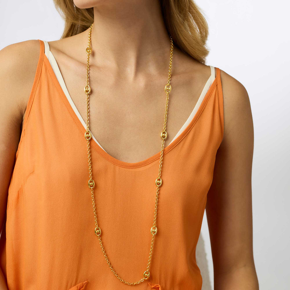 Model wearing the Julie Vos Laguna Station Necklace styled as a long single strand.