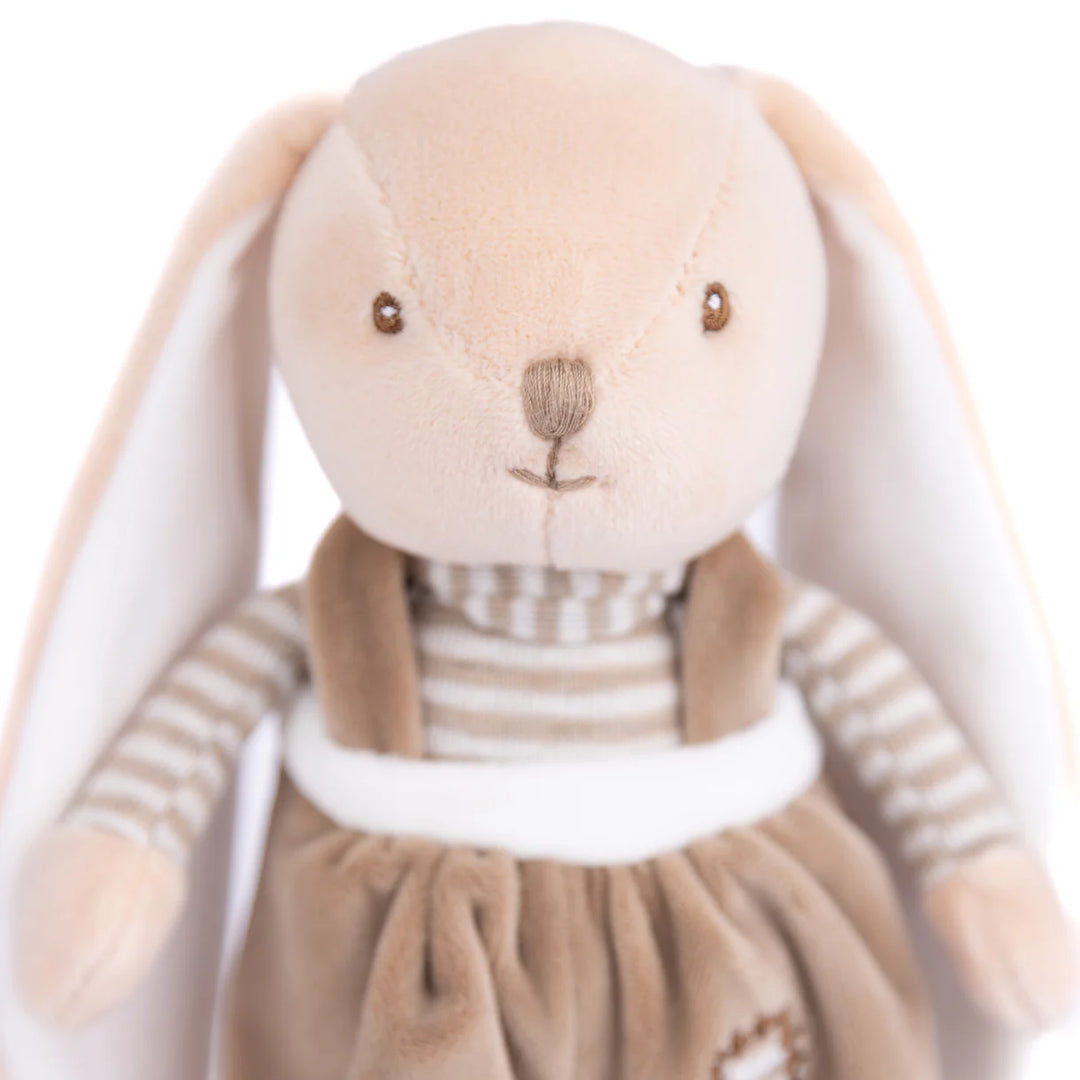 Plush bunny with long ears wearing tan overalls and a striped shirt, part of the Bukowski Bears Little Bunny Brothers collection.
