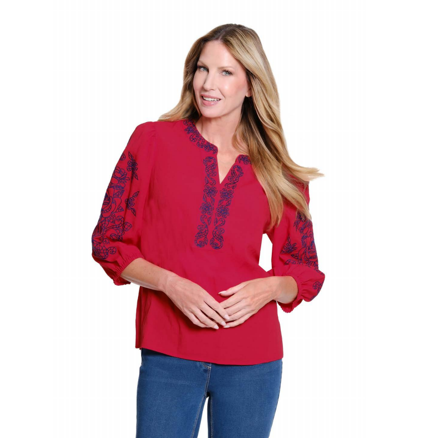 3/4 puff sleeve blouse in fiery red with tonal embroidery and a notch neckline.