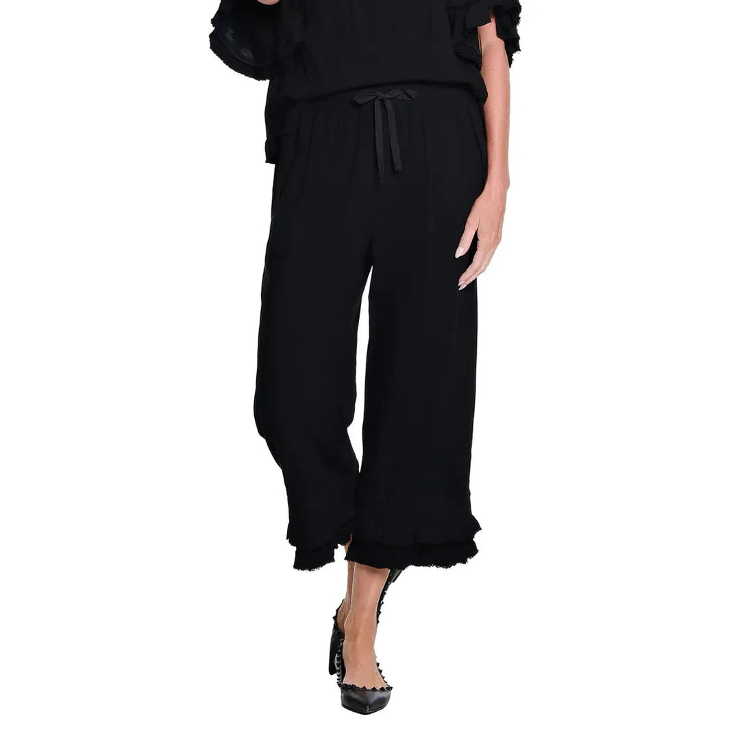 Multiples black textured slub crop pants featuring a double fringe flounce hem and drawstring waist.