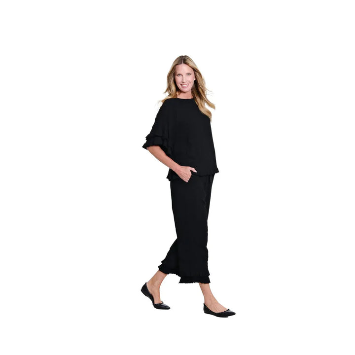 Multiples black pants showing the adjustable drawstring elastic waistband and front pocket detail.