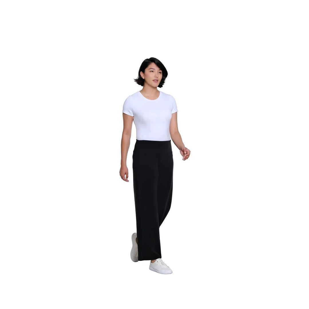 Multiples two-piece black knit set featuring a drop shoulder hi-low top and wide-leg ankle pants.