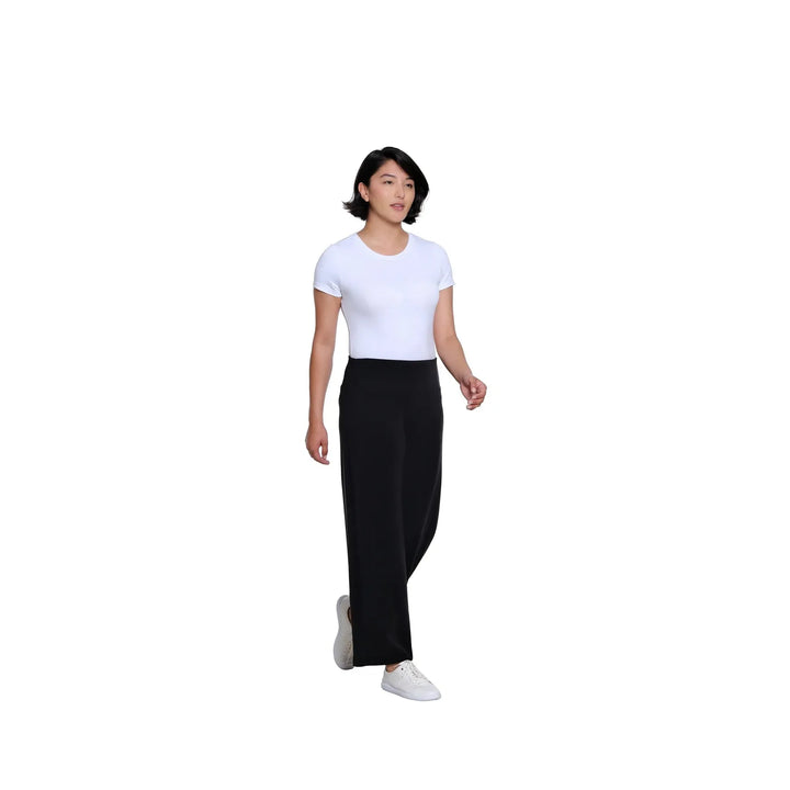 Multiples two-piece black knit set featuring a drop shoulder hi-low top and wide-leg ankle pants.