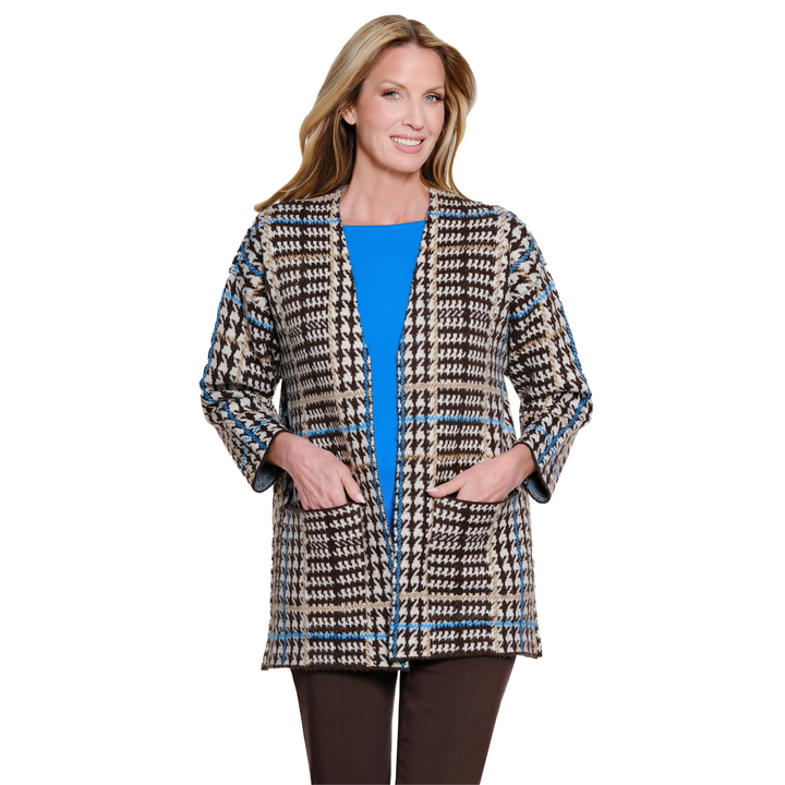 Woman wearing the Multiples plaid open-front sweater cardigan in multi-color layered over a blue top and dark pants.