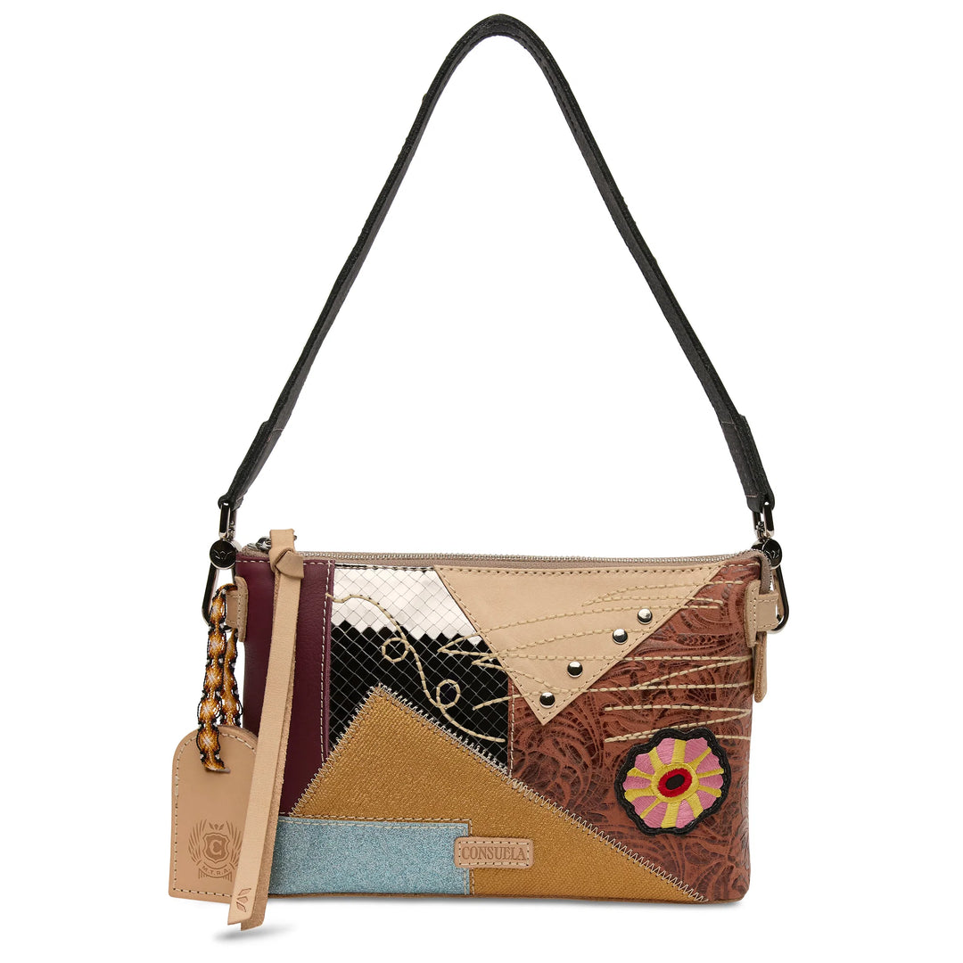 Consuela Max Midtown Crossbody patchwork bag shown with a short dark shoulder strap