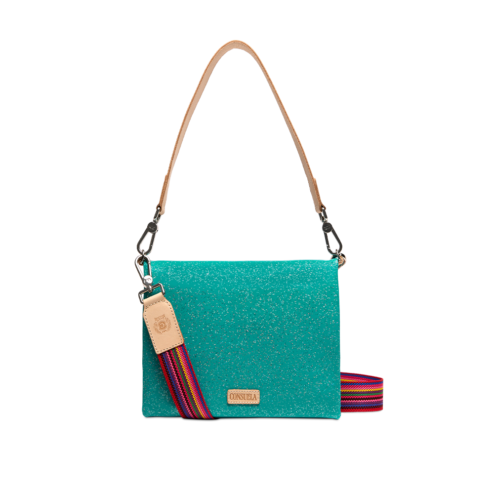 Consuela Shay Metro Crossbody front view of sparkling teal bag with rainbow accent strap