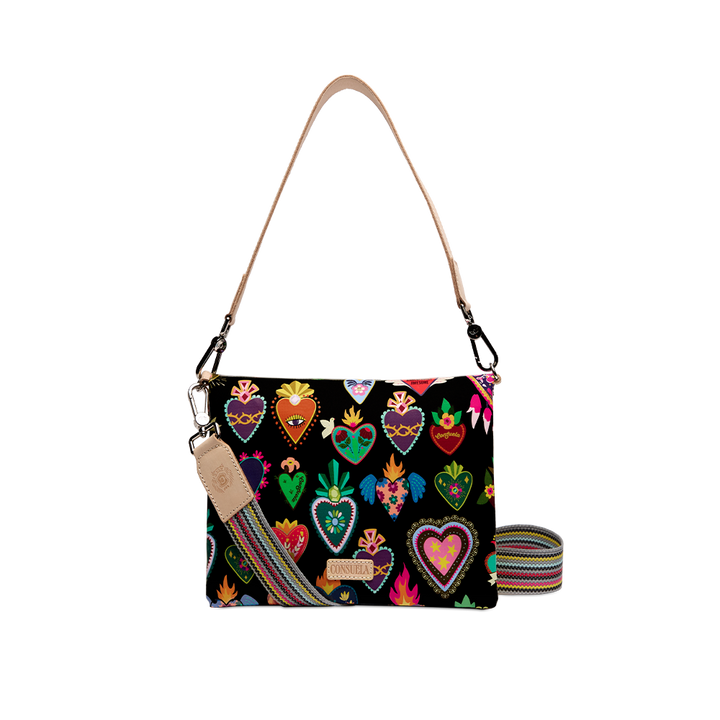 Consuela Vida Metro Crossbody front view of heart-print bag with colorful woven strap