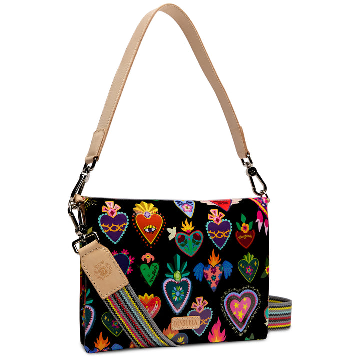 Consuela Vida Metro Crossbody angled three-quarter view showing front and side of heart-print bag
