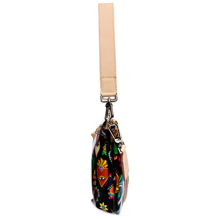 Consuela Vida Metro Crossbody side profile showing slim depth and tan leather handle